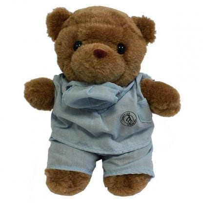 doctor teddy bear in blue surgeon scrubs